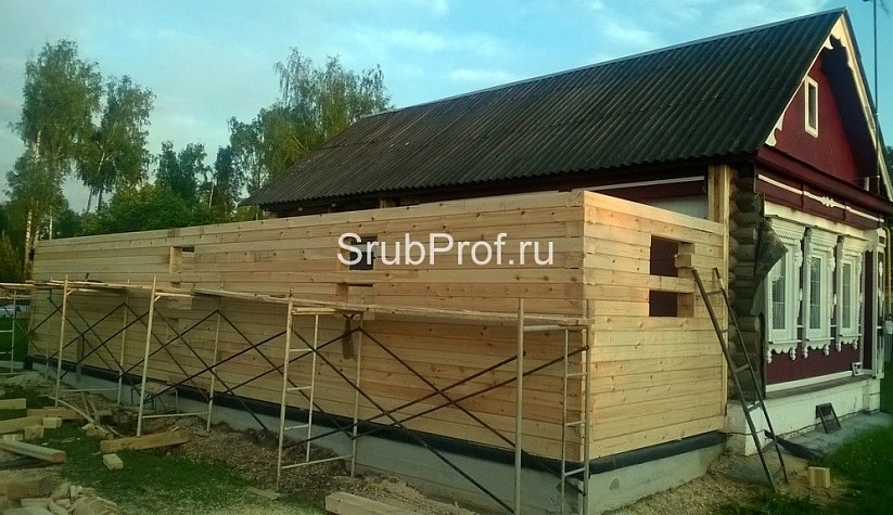 Пристройка из профилированного бруса к срубу
