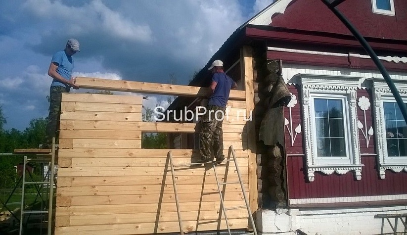 Пристройка из профилированного бруса к срубу