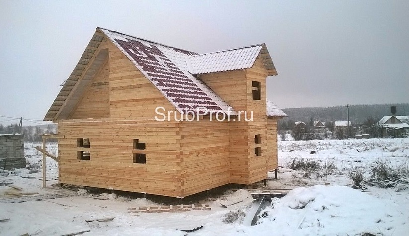 Сборка дома из обрезного бруса по проекту Черноголовка