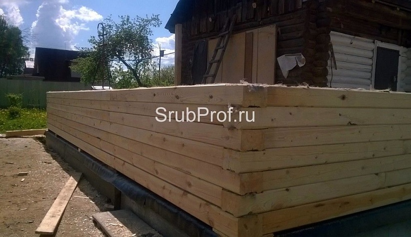 Пристройка из профилированного бруса к срубу
