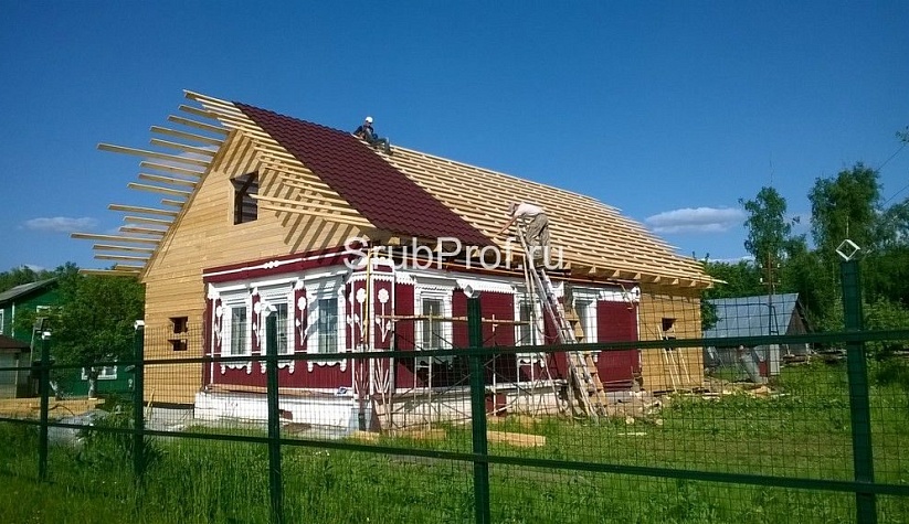 Пристройка из профилированного бруса к срубу