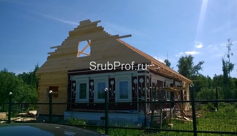 Пристройка из профилированного бруса к срубу