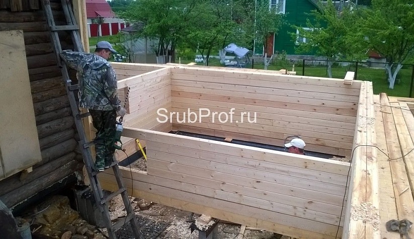 Пристройка из профилированного бруса к срубу